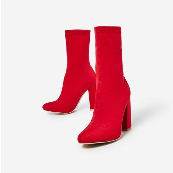red heeled sock boots